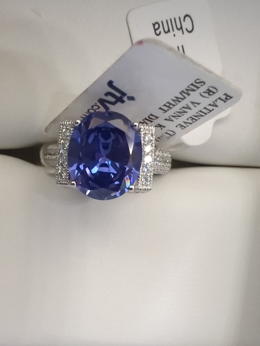 Vanna k Ring with Oval Blue Violet Stone and Pavé Accents.